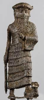 Three-faced Babylonia figure